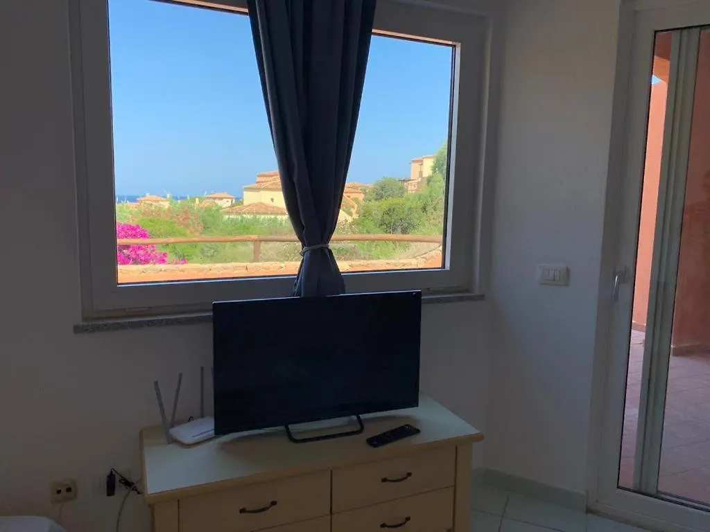 דירה איזולה רוסה Residence Cala Rossa איטליה